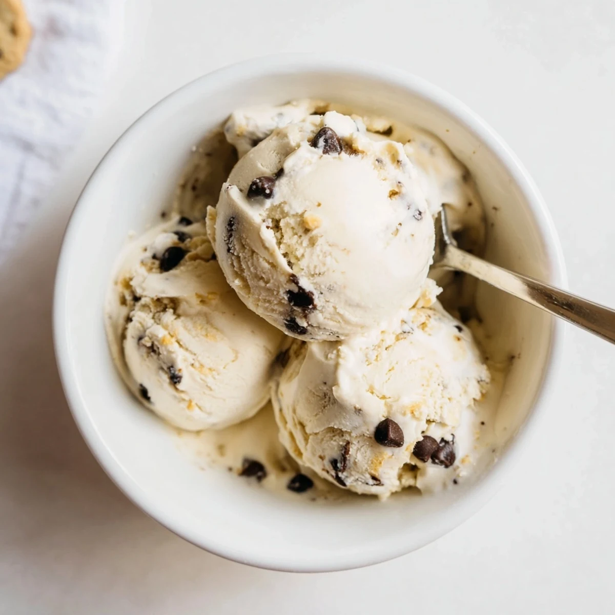 Creamy cottage cheese ice cream swirled with rich cookie dough bites.  