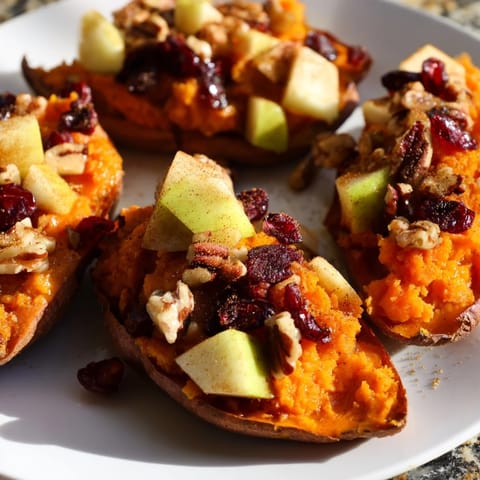 Warm and spiced cranberry apple twice-baked sweet potatoes, ready for enjoying a delicious harvest meal.