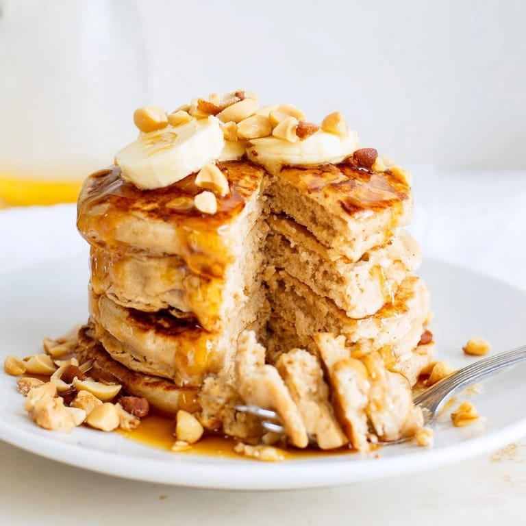 Easy American recipe: close-up of freshly cooked Peanut Butter Maple Oat Pancakes batter rising.