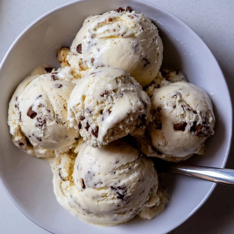 Guilt-free cottage cheese ice cream topped with delicious edible cookie dough chunks.  