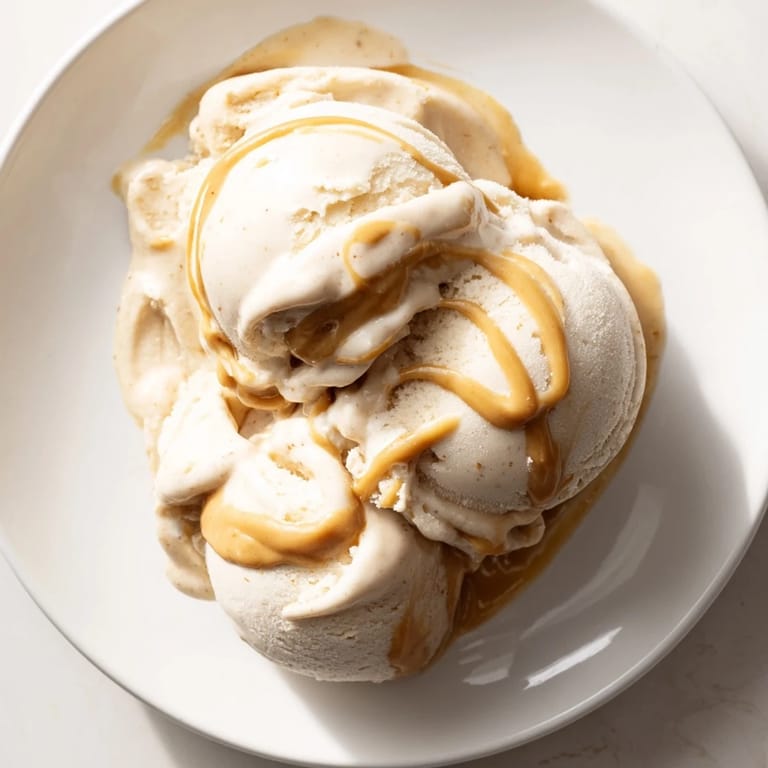 Thick and decadent peanut butter banana ice cream, blended smooth and ready to serve immediately.